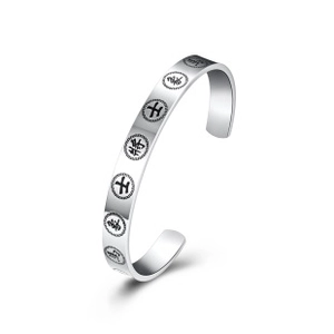 Silver cuff bracelet with circular engravings and traditional Chinese lucky characters