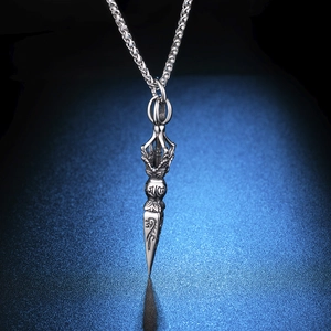 Vintage stainless steel Vajra pestle necklace with intricate religious carvings