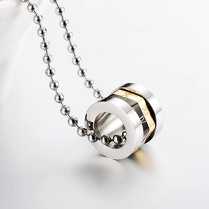 Roman numeral rotating pendant necklace in gold black and silver stainless steel