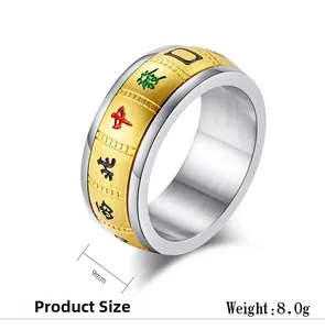 Close-up of 9mm rotatable mahjong ring in gold and silver with enamel characters