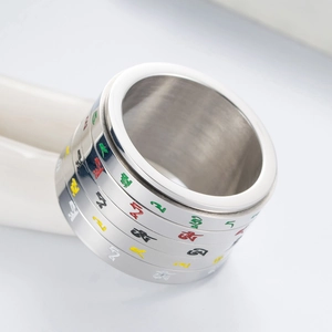 Bague rotative tibétaine en acier inoxydable avec des symboles sacrés colorés