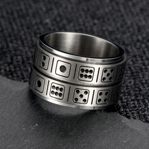 Vintage stainless steel spinner ring with engraved dice patterns for punk fashion
