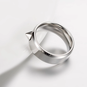 Minimalist stainless steel ring featuring a conical metal spike in punk style