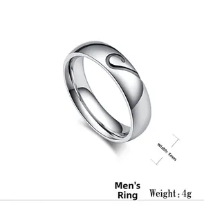 Close-up of a 5mm men's stainless steel ring with half-heart engraving and 4g weight detail