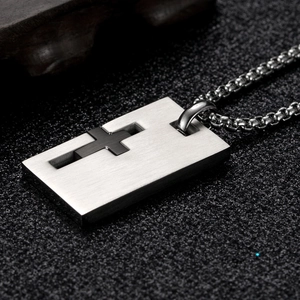 Titanium steel cross pendant necklace with silver and black contrast on matte base