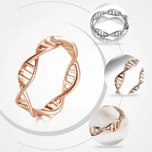 Detail view of DNA double helix ring in sterling silver and rose gold finish
