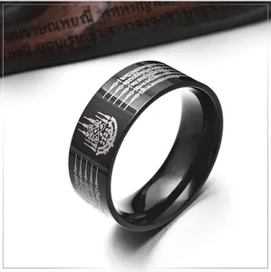 Polished black stainless steel ring featuring silver Thai script engravings and ethnic style