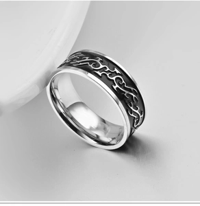 Mens stainless steel ring with black flame dragon pattern in a polished mirror finish