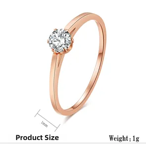 Detail view of a 1mm thin rose gold solitaire ring with 1g weight specifications