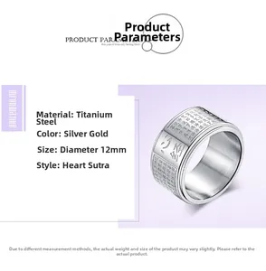 Detailed macro view of silver titanium steel spinning ring with gold Heart Sutra script