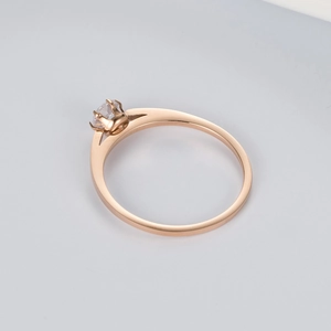 Elegant rose gold solitaire ring with round cubic zirconia in a six-prong setting