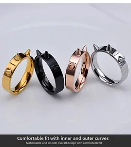 Set of four punk style spike rings in gold, black, rose gold, and silver finishes