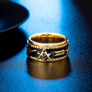 Men's spinning Freemason ring in gold and black stainless steel with embossed emblem