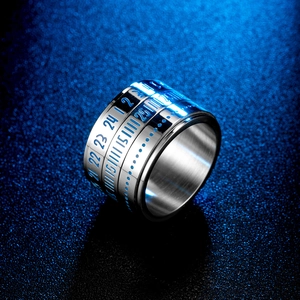 Luminous gold rotating ring with Arabic numerals and industrial brushed steel texture