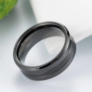 Minimalist black stainless steel ring for men featuring brushed matte and polished edges