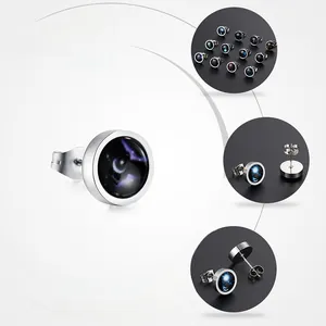 Detailed macro view of glowing star pattern ear studs with stainless steel backings
