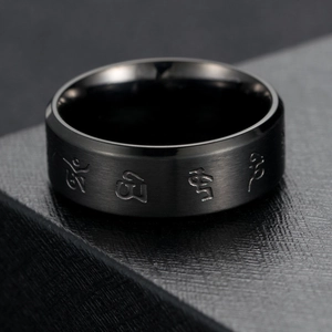 Men's black brushed stainless steel ring with engraved Buddhist mantras and symbols