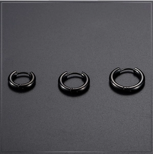 Three sizes of polished black stainless steel hoop earrings shown in a horizontal row