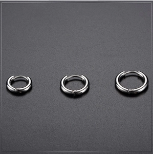 Three sizes of polished stainless steel silver huggie hoop earrings for men and women