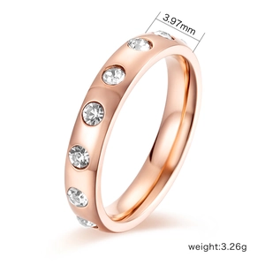 Rose gold stainless steel ring with white zircon stones, 3.97mm wide and 3.26g weight
