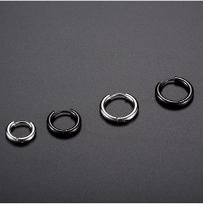 Polished stainless steel huggie earrings in silver and black colors with diverse sizes