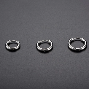 Polished silver stainless steel hoop earrings in three sizes with a hinged closure