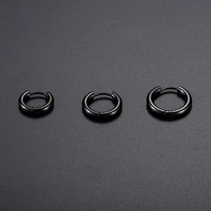 Three sizes of black stainless steel hoop earrings with polished finish for men and women