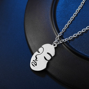 Abstract artistic face pendant necklace in titanium steel with brushed metal finish