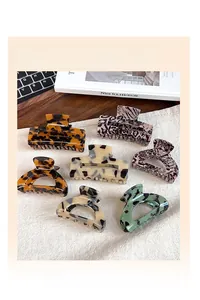 Detailed set of leopard and marble pattern hair claw clips for versatile hairstyling