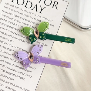 Elegant butterfly acetate hair clips with inlaid rhinestones and sparkling crystals