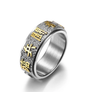 Anillo giratorio vintage de acero inoxidable con caracteres chinos dorados antiestrés