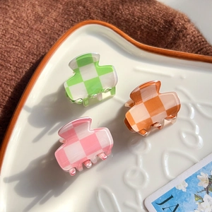 Three-piece checkered pattern mini hair clips in green, orange, and pink colors