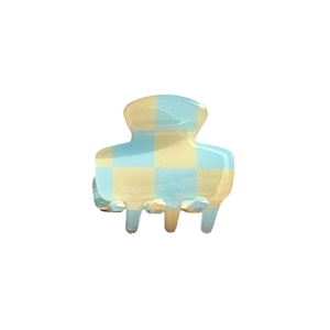 Fashionable blue and beige checkered acetic acid hair claw clip on white background