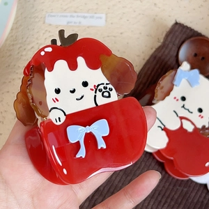 Cartoon puppy hair claw clip in red apple-shaped design with blue bow for women