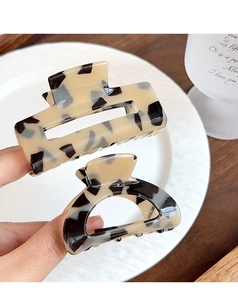 French leopard tortoise shell hair claw clips showing a rectangular and semi-circle design