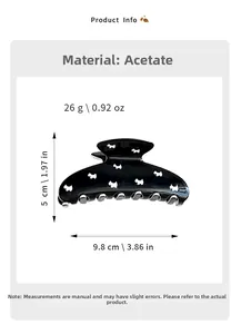 Detail showing acetate hair claw clip dimensions 9.8cm x 5cm with dog cutout pattern