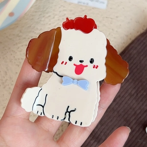 Cartoon white dog hair claw clip with a red beret and blue bow made of acetate