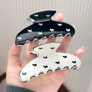 Minimalist Scottie dog pattern hair claw clips in black and white high-gloss finish