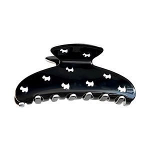 Glossy black cutout dog claw clip hair accessory with minimalist half-round design