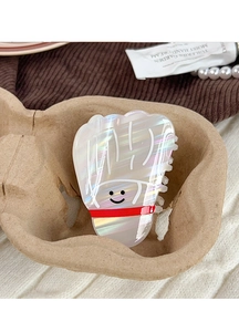 Détail de la pince à cheveux créative de badminton blanc perle avec design souriant