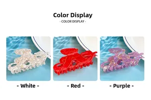 Détail macro de pinces à cheveux poulpe colorées en acétate avec effet marbré