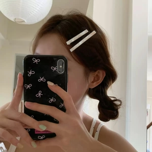 Two rectangular tortoiseshell acetate hair clips with marble texture for women