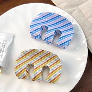Minimalist striped M-shape hair claw clips for women in blue-pink and orange-yellow colors