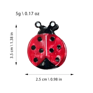 Cartoon ladybug hair clip in red acetate with dimensions and weight measurements
