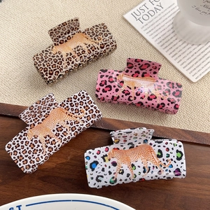 Leopard print PVC hair claws in four colors with running leopard pattern for women