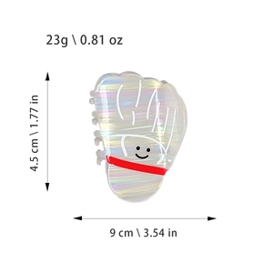 Pince à cheveux irisée en forme de pied avec smiley et dimensions du produit en cm