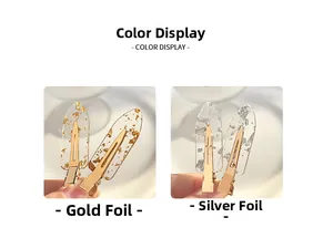 Detail view of transparent resin hair clips with embedded gold and silver foil flakes