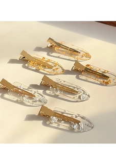 Detailed set of clear resin hair clips with elegant gold and silver foil flakes