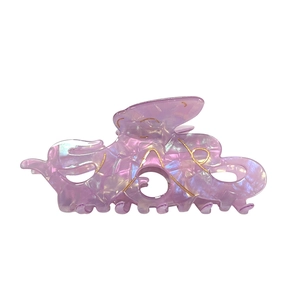 Pince à cheveux pieuvre lilas colorée avec effet nacré et détails de lignes dorées d'art
