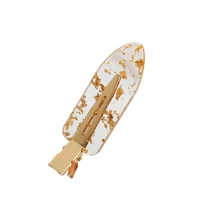 Transparent resin hair clip with gold foil flakes on a premium metallic base